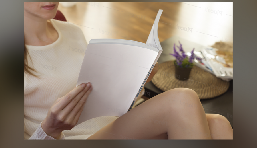 A girl reads a paper book Mockup 